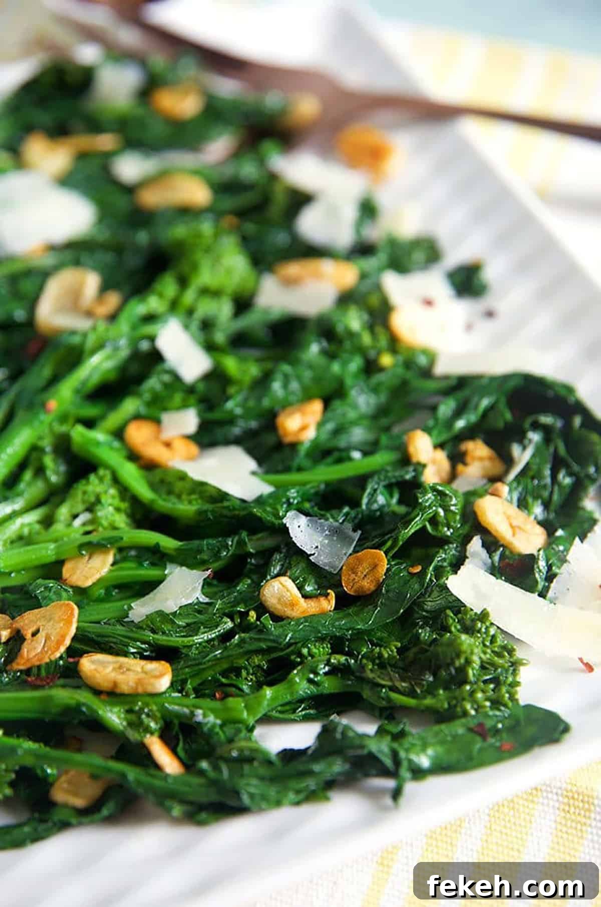Garlicky Sautéed Broccoli Rabe with Lemon and Chili Flakes 3 Broccoli Rabe with garlic on a white platter.