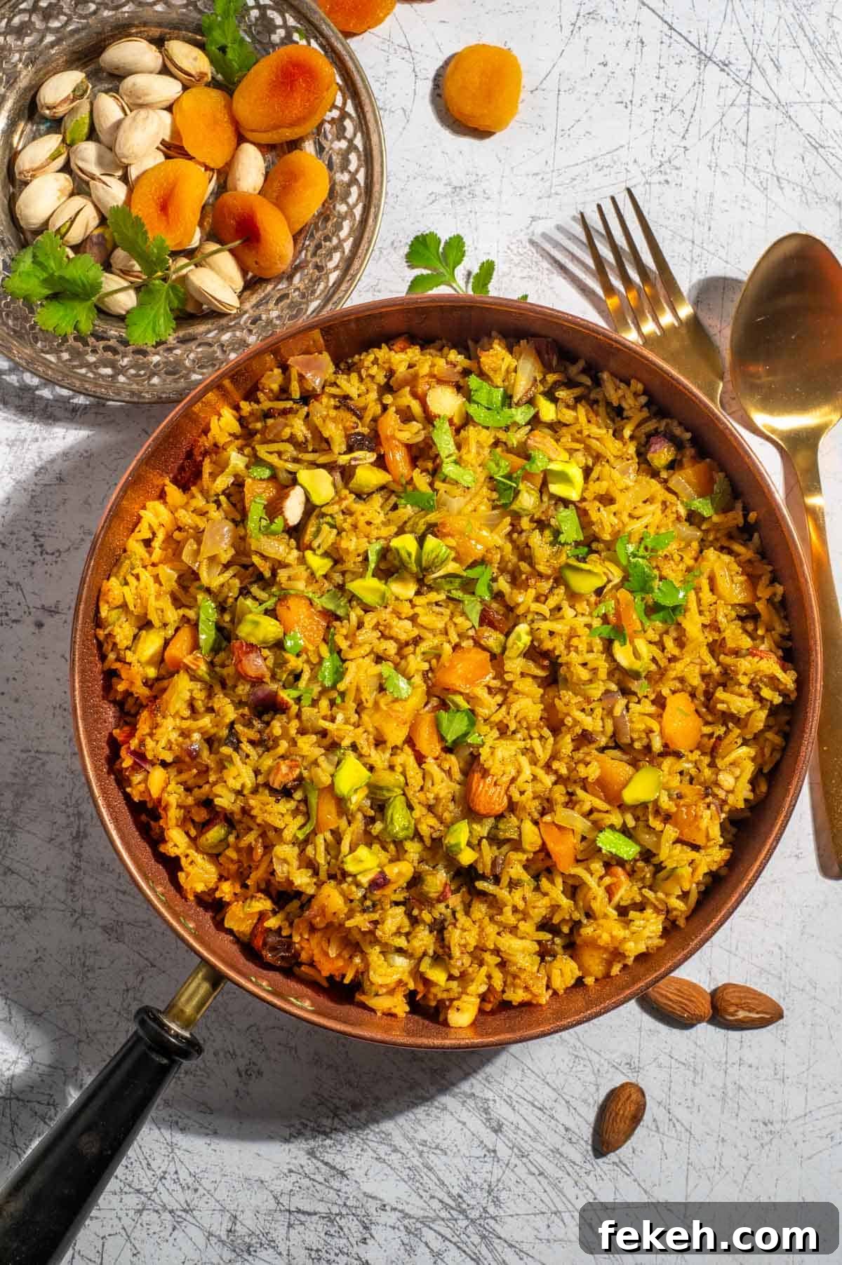 Majestic Moroccan Rice Pilaf with Saffron and Aromatic Spices 2 Moroccan rice in a copper pan.