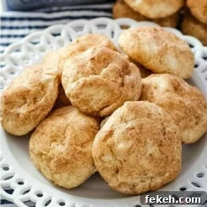 Bake up some soft, pillowy, cinnamon-cream cheese cookie goodness! Add these Snickerdoodle Cream Cheese Cookies to your holiday baking menu!