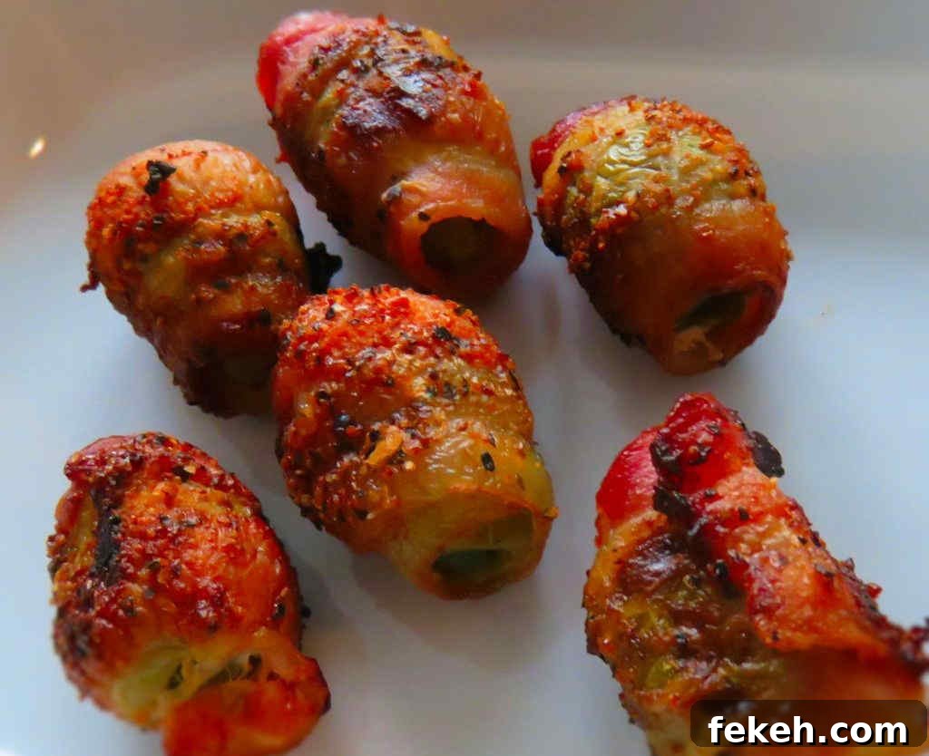 Bacon-Wrapped Jalapeño-Stuffed Olives on the Grill 2 Grilled Bacon-Wrapped Jalapeno-Stuffed Olives