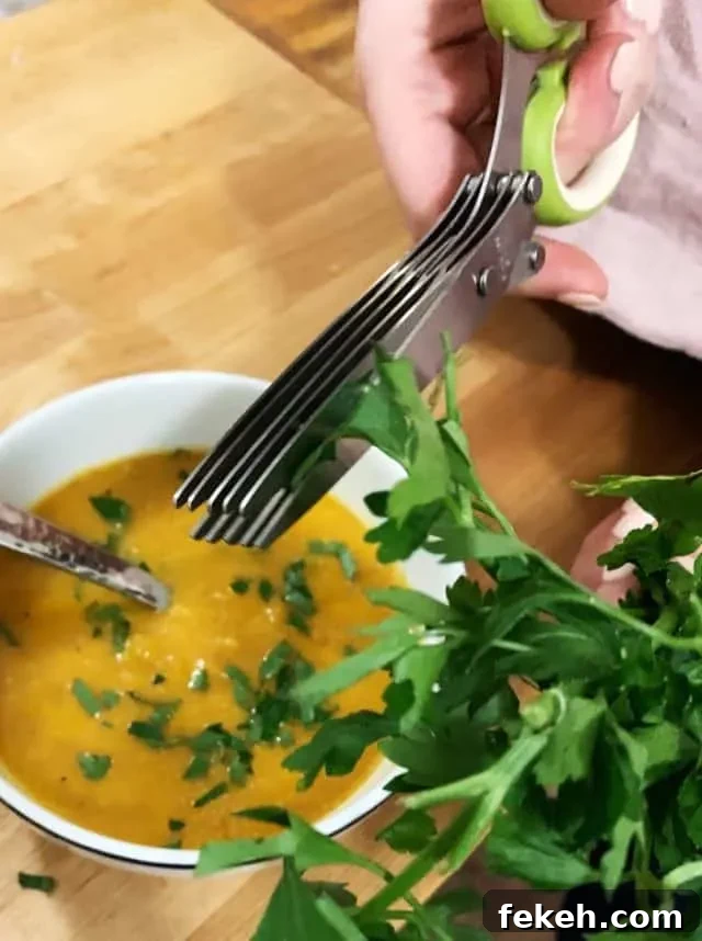 herb shears cutting parsley