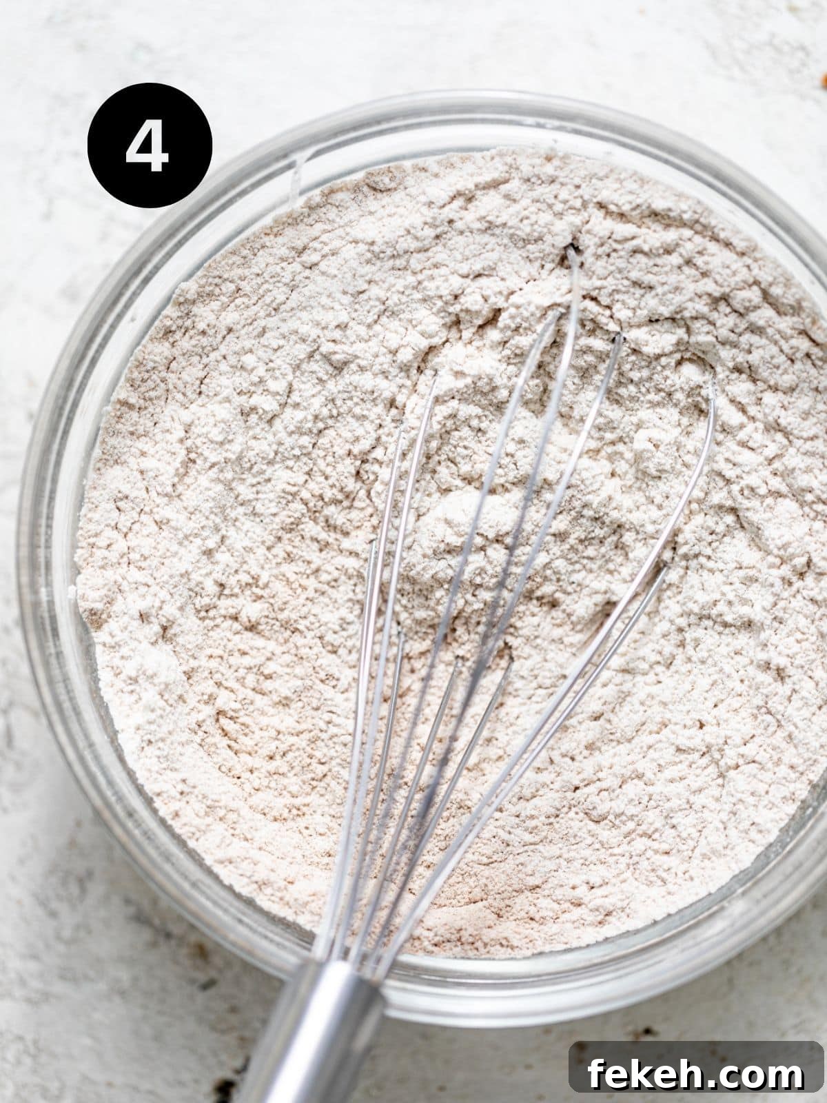 Cardamom Coffee Cake Recipe: Aromatic Spiced Bundt Cake 7 flour, baking soda, kosher salt, cinnamon, and cardamom whisked together in a bowl.