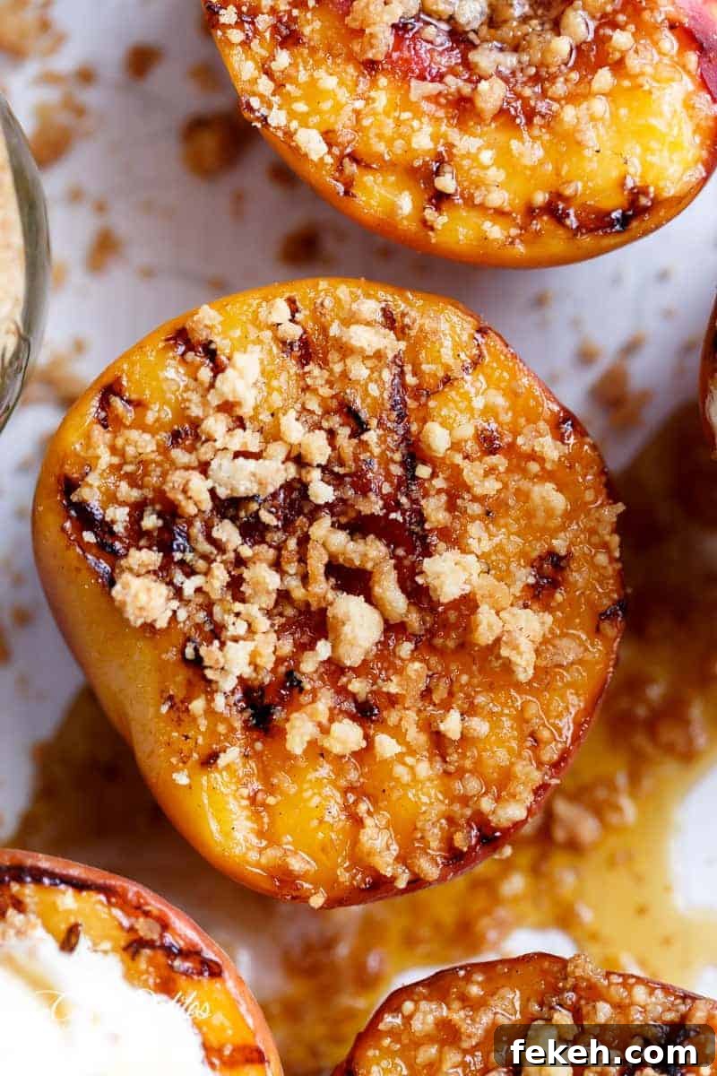 Maple-Grilled Peaches with Almond Cookie Crumble 10 Zoom in image of Maple Grilled Peaches With An Almond Cookie Crumb