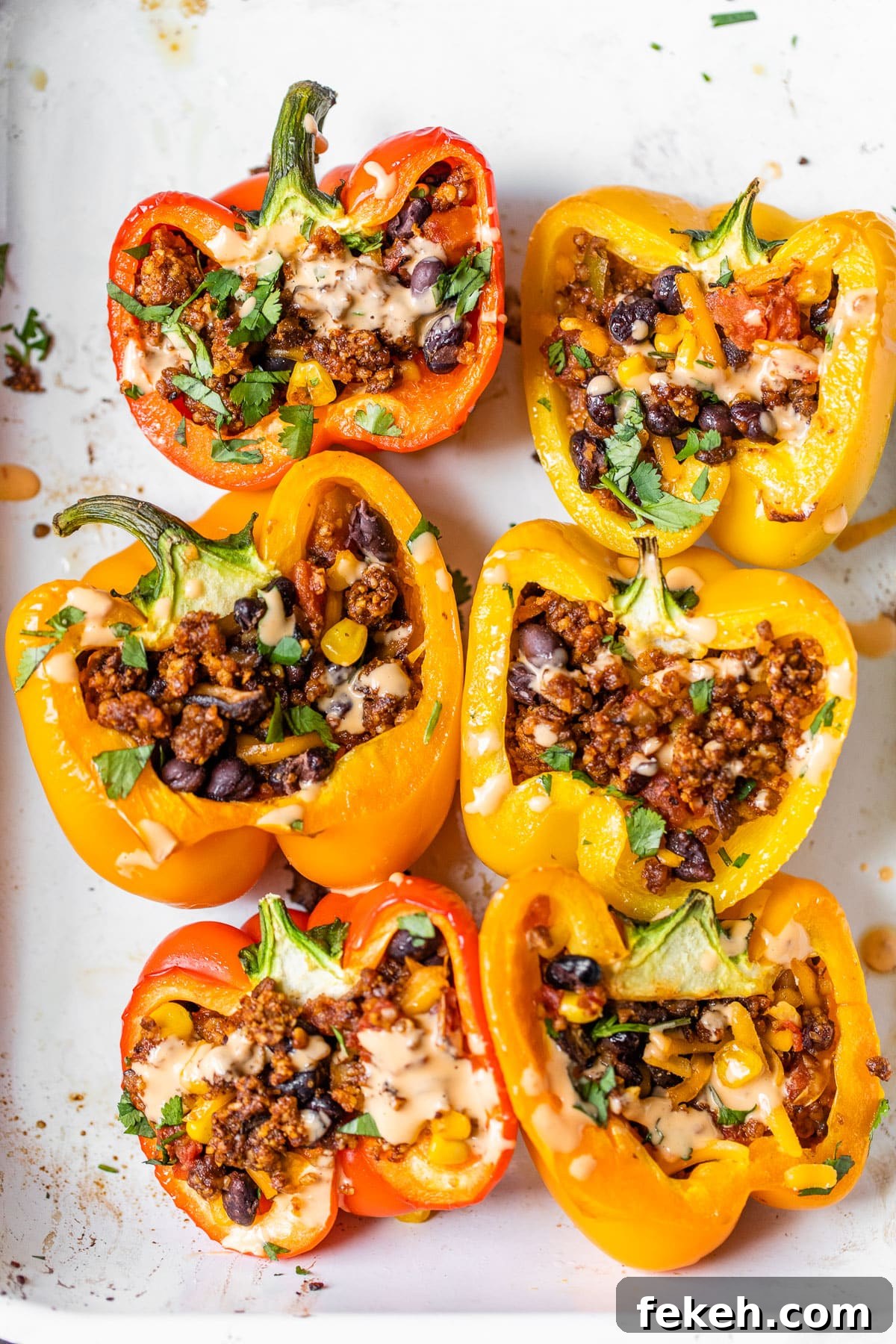 stuffed bell peppers in a casserole dish