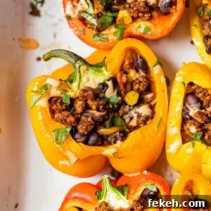 stuffed bell peppers in a casserole dish