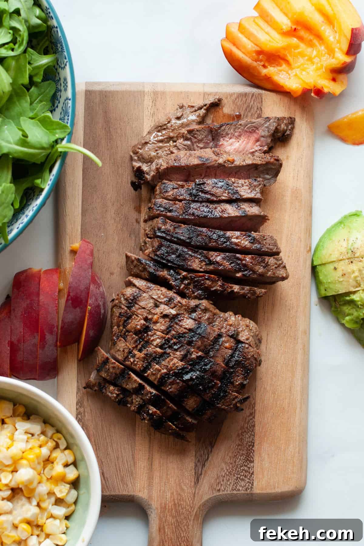 Grilled Steak with Peach Salad Recipe for Summer Meals 5 grilled steak on cutting board