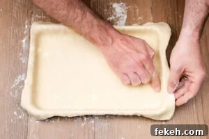 Classic Cheese Flan Recipe: Old-Fashioned Dinner Dessert 8 Placing the short crust pastry onto the baking tray