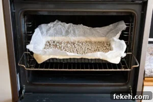Classic Cheese Flan Recipe: Old-Fashioned Dinner Dessert 10 Pastry case being blind baked in the oven