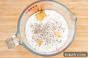 Classic Cheese Flan Recipe: Old-Fashioned Dinner Dessert 11 Eggs, whole milk, salt and pepper in a jug
