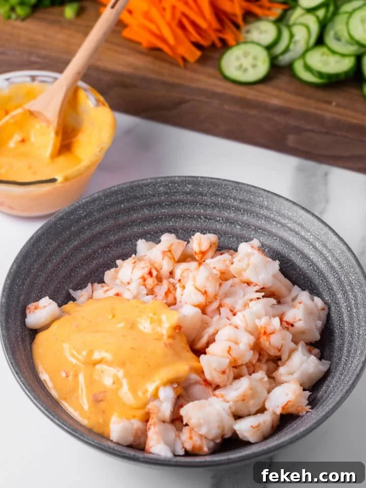 Spicy Shrimp Poke Bowl Recipe with Fresh Mango & Avocado 7 chopped shrimp and sauce