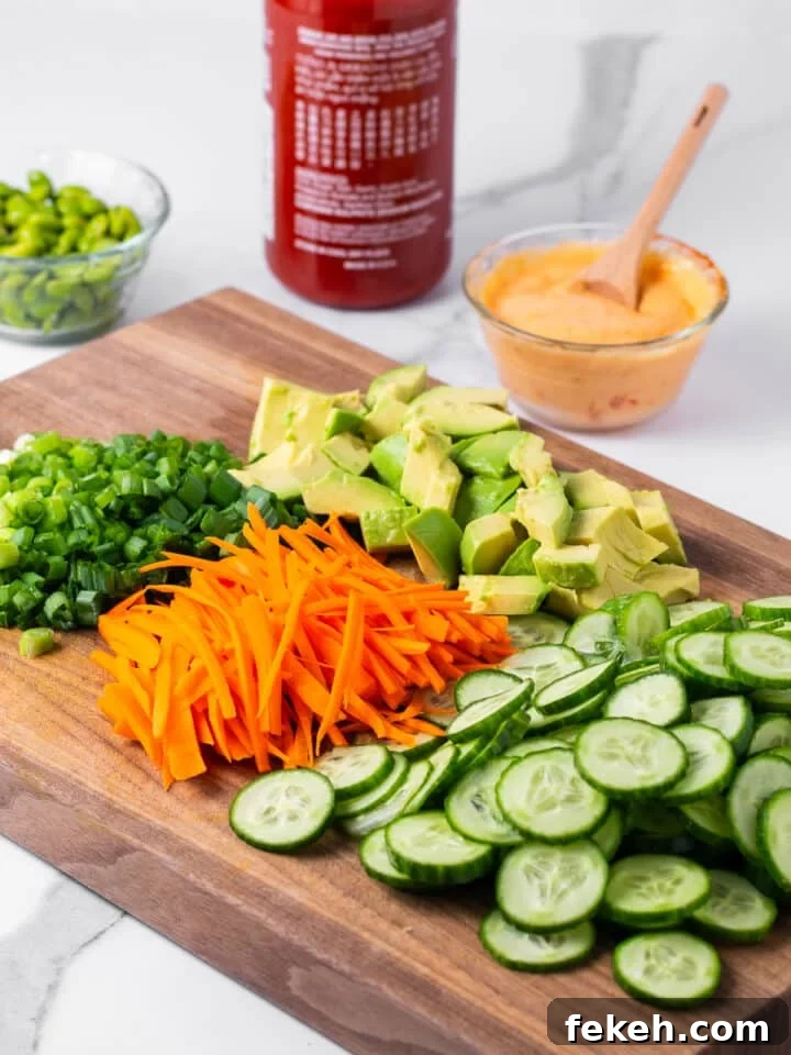 Spicy Shrimp Poke Bowl Recipe with Fresh Mango & Avocado 10 mise en place veggies on cutting board