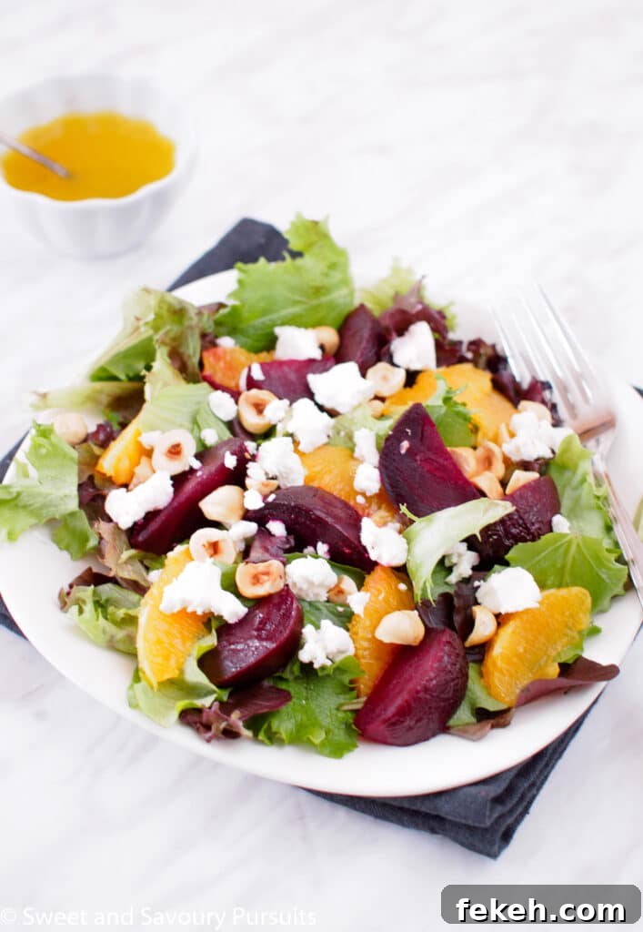 Plate of Roasted Beet and Orange Salad served with Citrus Vinaigrette.