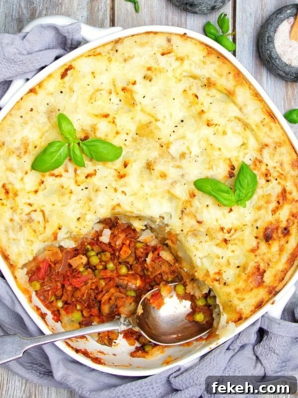 Cheesy Potato Pie Recipe: Crispy Crust & Melty Filling 14 Vegan Shepherd’s Pie served in a dish.