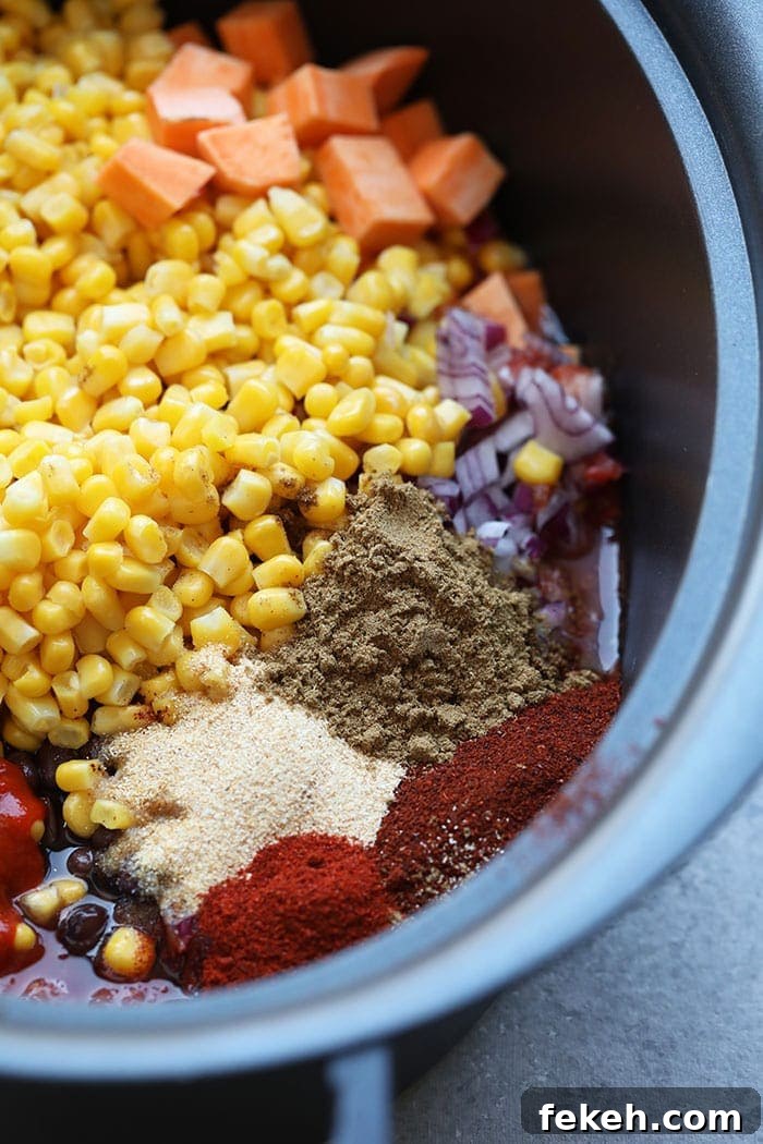 Whip up this savory Slow Cooker Mexican Quinoa for a pantry-staple meal that's also naturally vegan and gluten-free! Mexican quinoa ingredients, uncooked, in slow cooker
