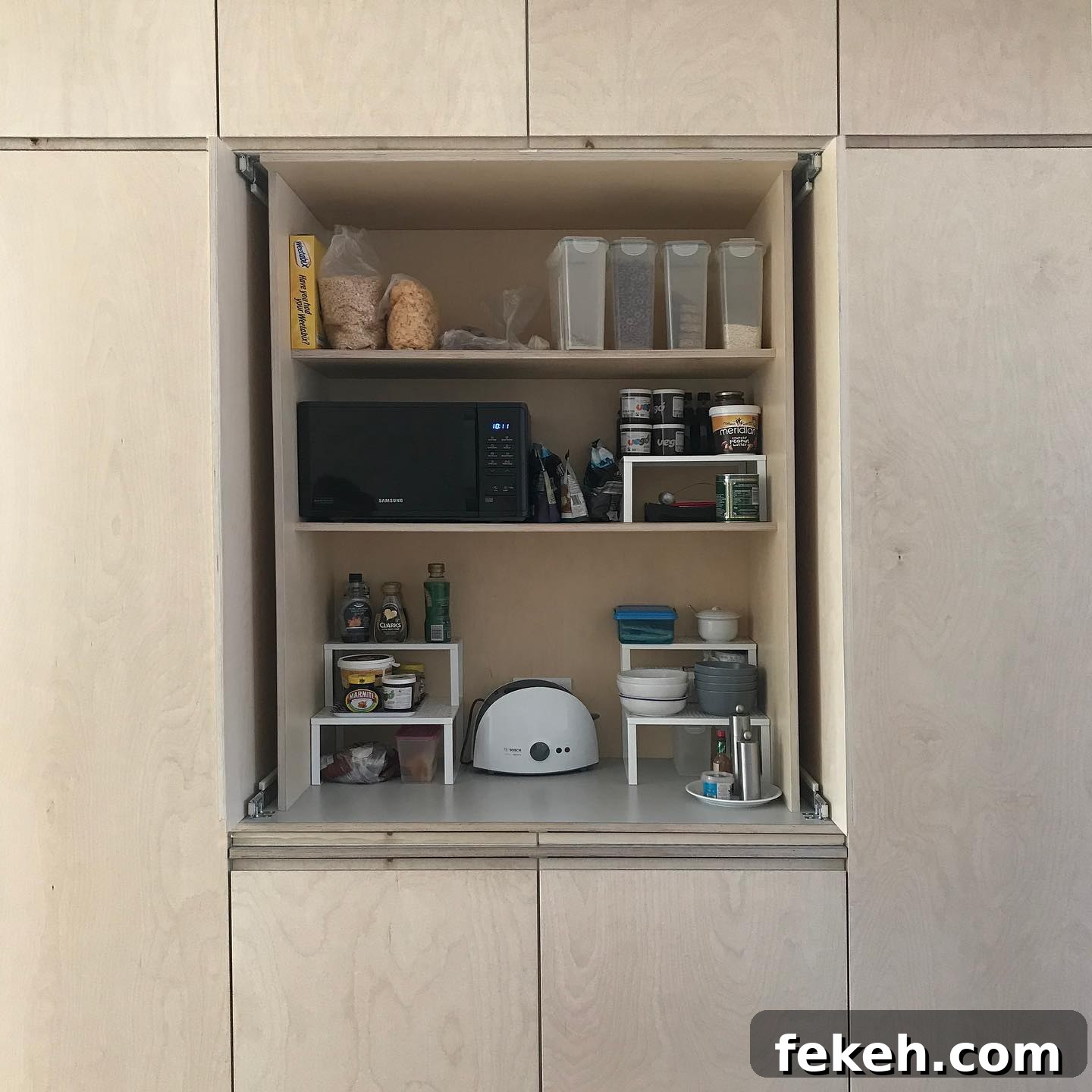 21 Smart Kitchen Upgrades to Conceal Small Appliances 5 3. Hidden Breakfast Nook