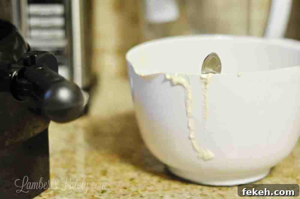6-Week Breakfast Prep Plan with Weekly Menus & Printables 3 white bowl of pancake batter with spoon in it on a counter.