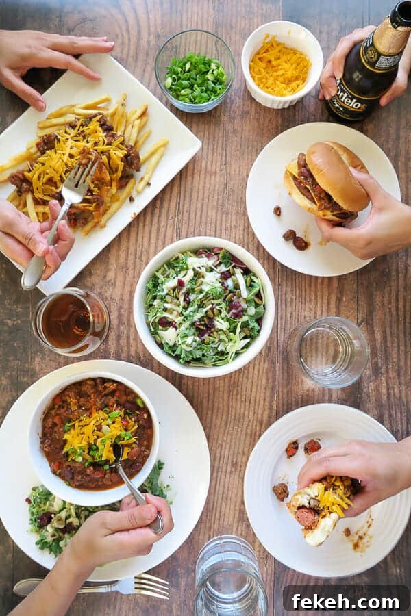 Slow-Cooker Three-Meat, Three-Bean Chili Recipe 11 3 meat 3 bean chili being eaten as a bowl of chili, a chili cheeseburger, chili cheese dog, and chili cheese fries!