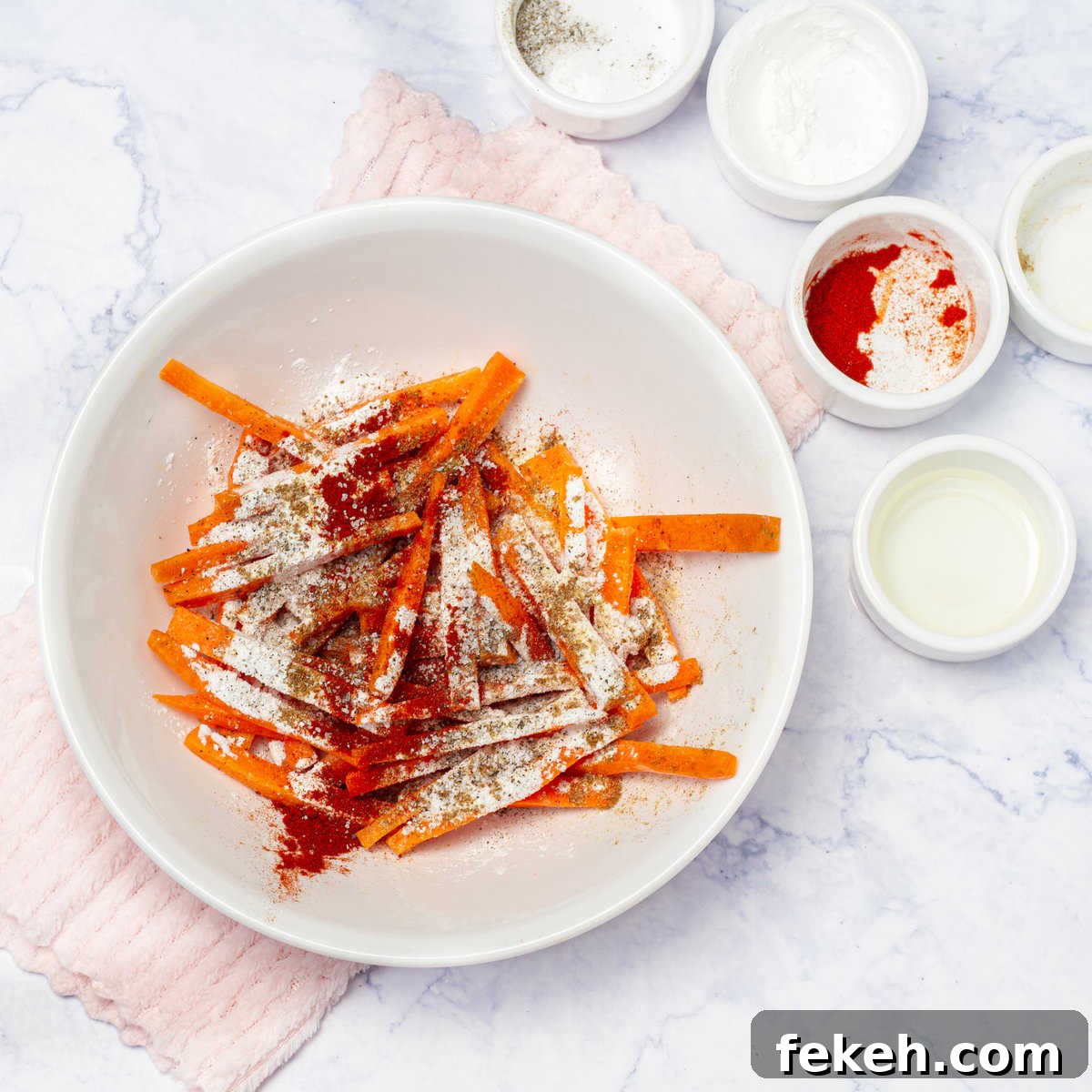 Crispy Baked Carrot Fries with Garlic-Parmesan Dip 4 Add the carrot sticks to the bowl with the seasoning mixture