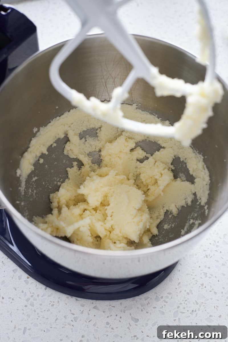 Strawberry Almond Muffins Recipe with Crispy Streusel Topping 5 Creamed butter and sugar in the bowl of a stand mixer.