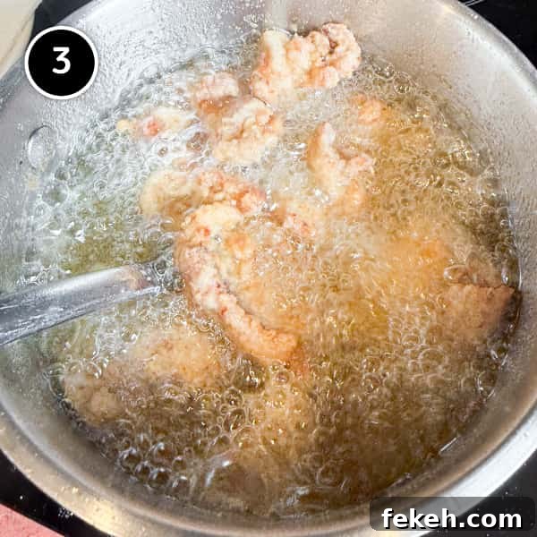Karaage chicken frying in hot oil