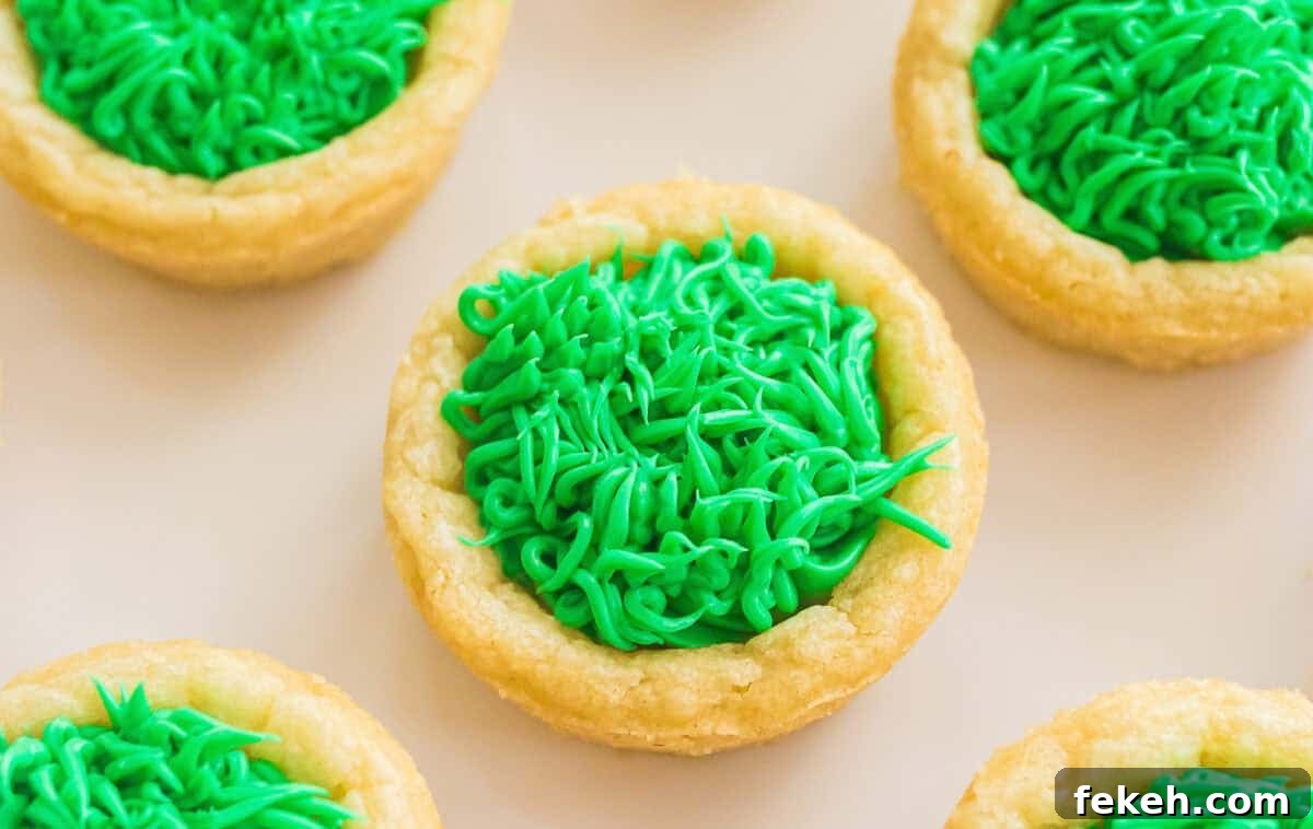 Easter Cookie Recipes for Spring Baking and Festive Treats 6 Piping frosting into cookie cups