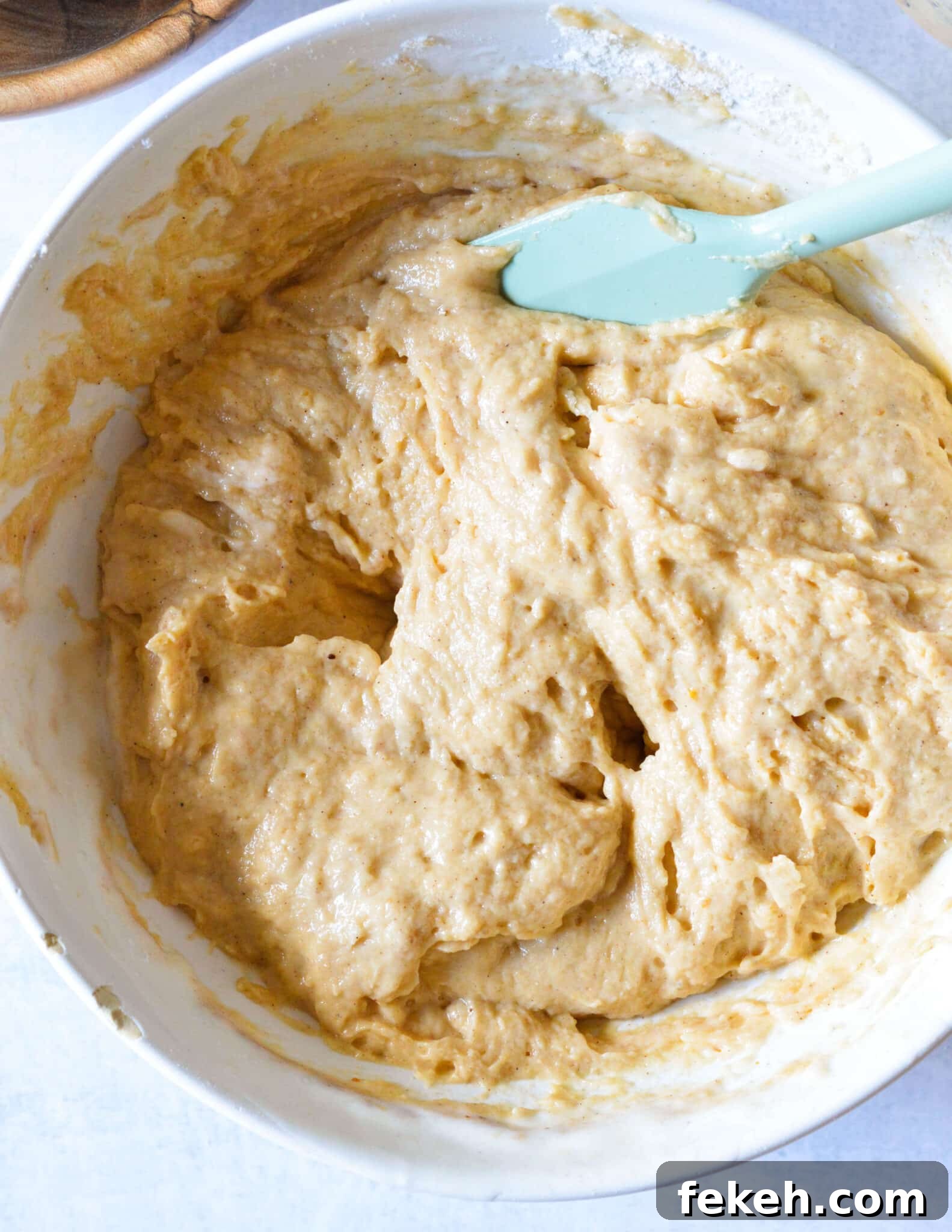 Gluten-Free Pumpkin Pancakes Recipe for Fluffy Fall Mornings 8 a bowl of gluten free pumpkin pancake batter.