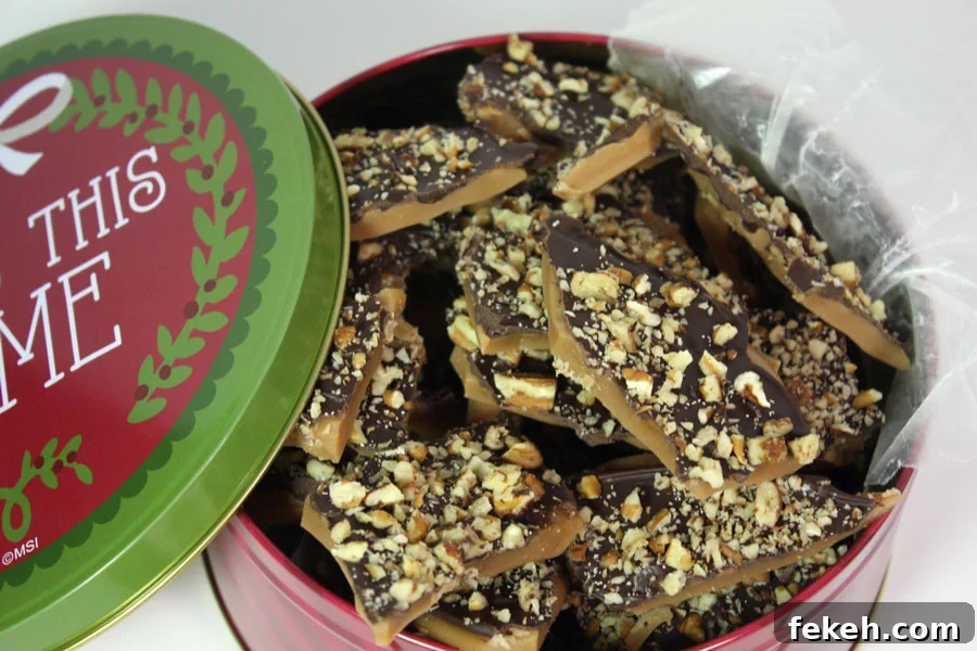 Crunchy Butter Toffee Pretzel Recipe — Sweet & Salty Treat 8 Homemade toffee in a cookie tin.