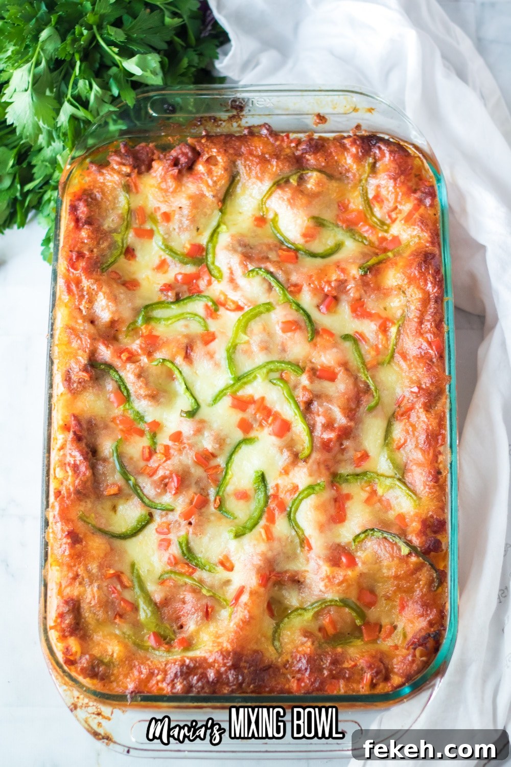 uncut christmas lasagna in a glass casserole dish