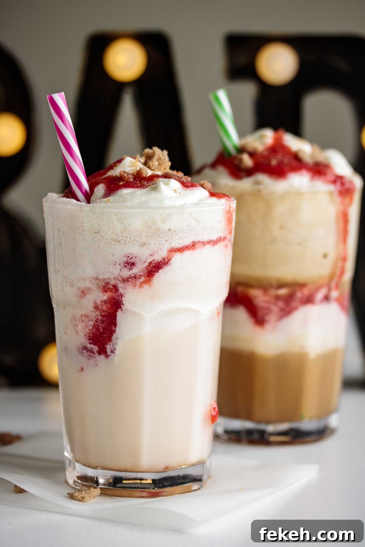 Starbucks Strawberry Funnel Cake Frappuccino Review & Order Guide 2 Both versions of this Frappuccino, with colorful reusable straws.