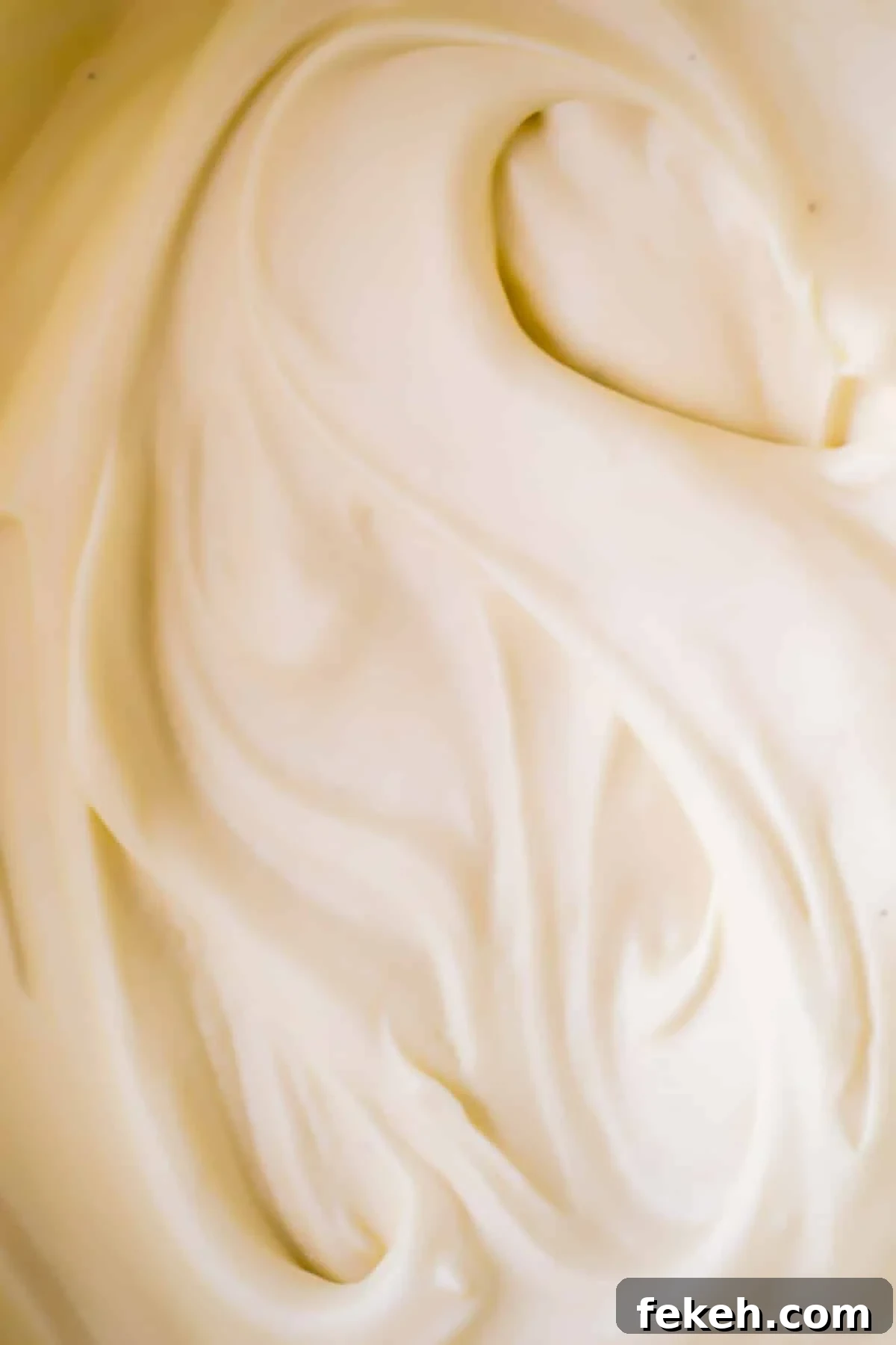 Cream Cheese Frosting Recipe: Smooth, Tangy Icing for Cakes and Cupcakes 2 Upclose creamy smooth cream cheese frosting.