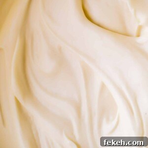 Cream Cheese Frosting Recipe: Smooth, Tangy Icing for Cakes and Cupcakes 8 Upclose creamy smooth cream cheese frosting.