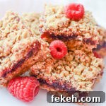 Easy raspberry oatmeal bars recipe - gluten-free with vegan & dairy-free option
