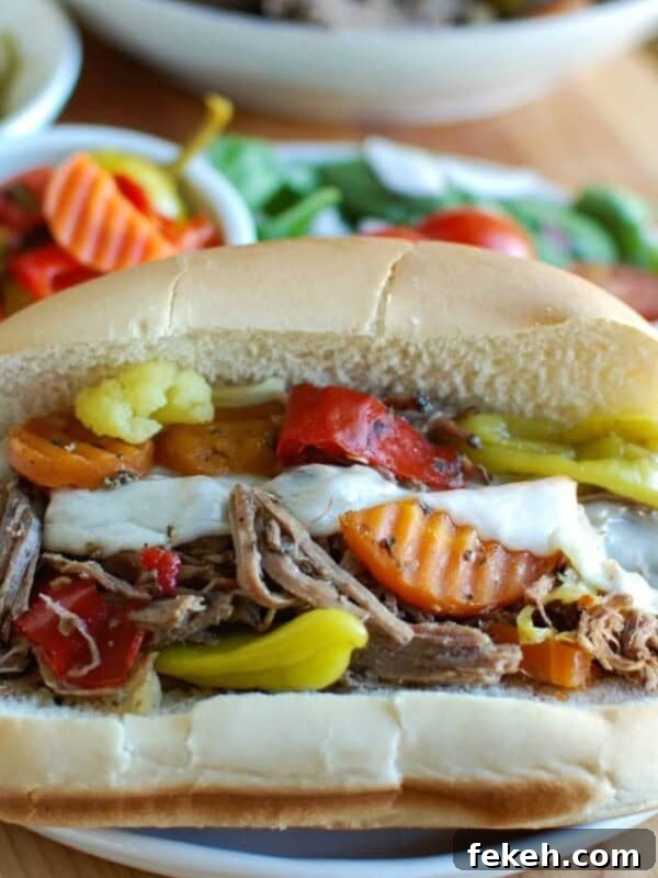 Taco Beef Sliders: Quick Party Sliders with Spicy Beef & Cheese 12 Slow Cooker Italian Beef Sandwiches on a white plate and on a bun