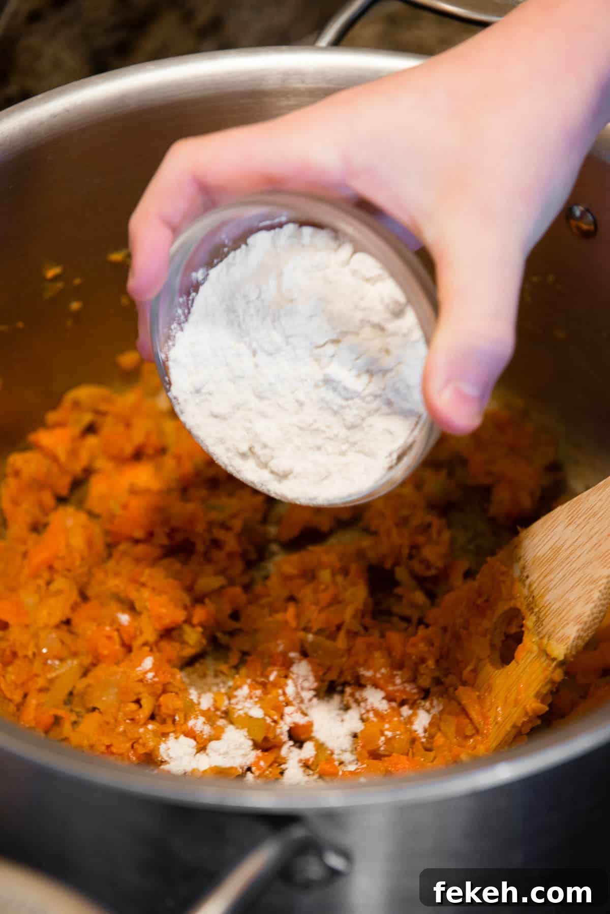 adding flour to mirepoix