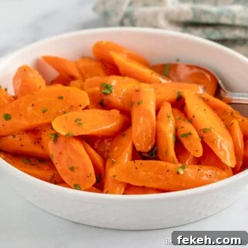 A dish filled with Maple Glazed Carrots.