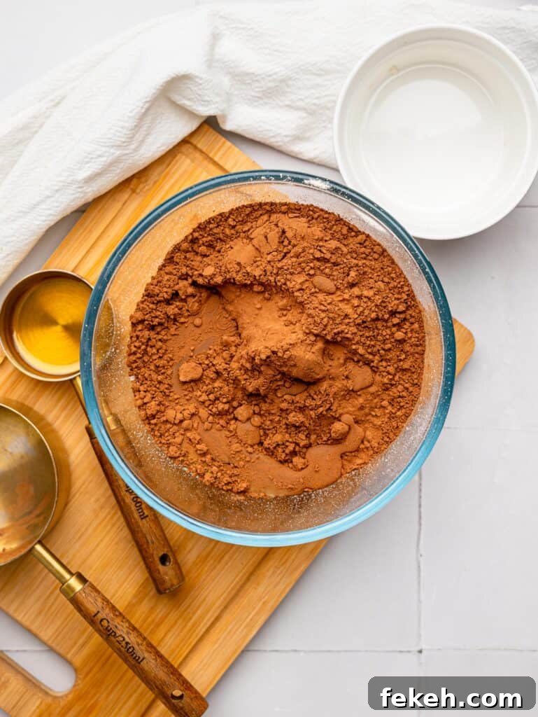 No-Bake Mini Triple Chocolate Cheesecakes Recipe 9 No Bake Chocolate Cheesecake Crust Ingredients in a bowl.