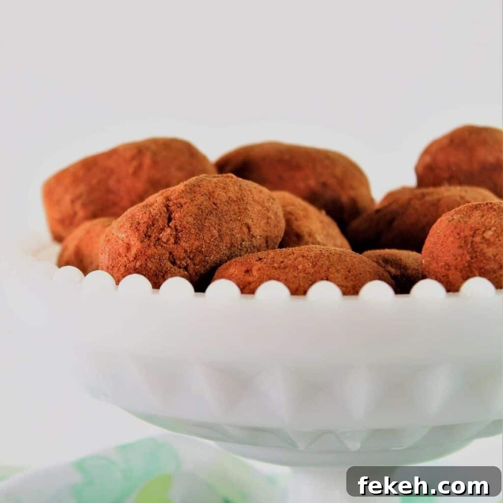 irish potato candy in white pedestal dish with shamrock scarf around bottom