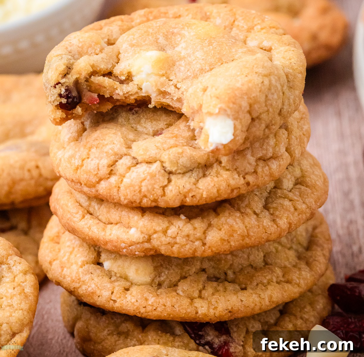 White Chocolate Cranberry Cookies Recipe for Holiday Baking 5 stack of buttery white chocolate cookies with cranberries