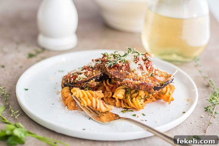 12 Clean-Eating Recipes You’ll Love from 2017 12 Eggplant Parmesan Pasta / This gluten free baked pasta dish is a great! Made #glutenfree with Chickapea Pasta, and layered with crispy baked eggplant slices and lots of cheese!