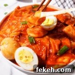 Cheesy Rice Paper Tteokbokki: Crispy, Gooey Korean Street Food 11 Cheese stretch from rice paper tteokbokki