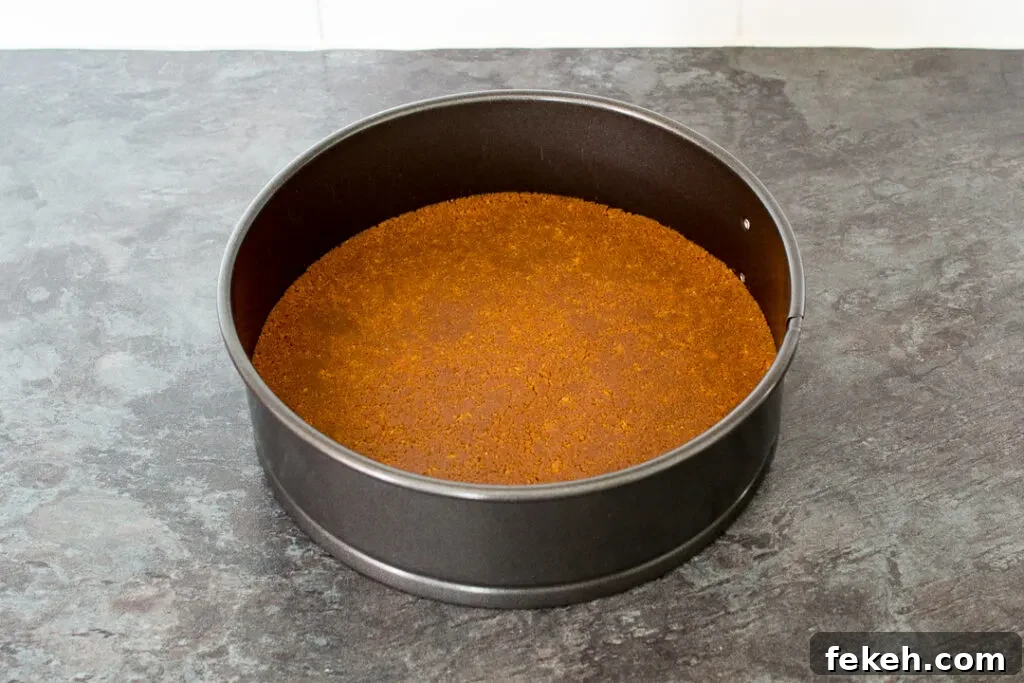 No-Bake Biscoff Cheesecake Recipe with Crunchy Cookie Crust 8 Biscoff cheesecake base pressed into a springform pan