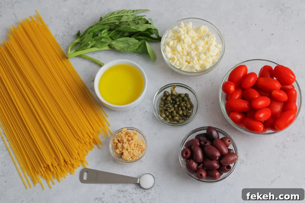 Ingredients in bowls for Greek Spaghetti. 