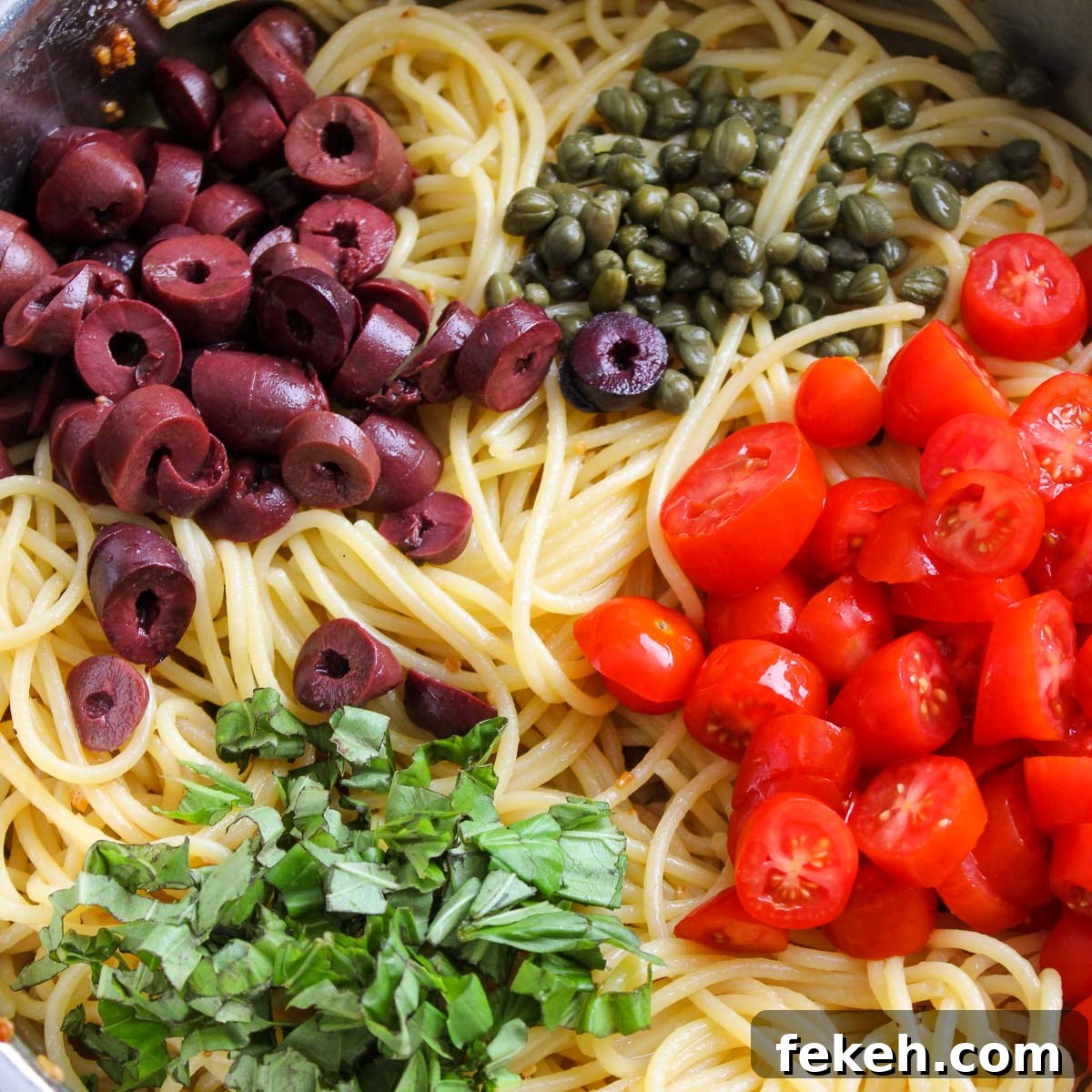 Mixed in chopped vegetables and capers with the garlic seasoned noodles.