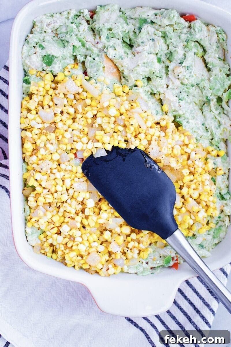 Creamy Chicken Enchilada Casserole Topped with Mexican Street Corn 5 Chicken Enchilada Casserole