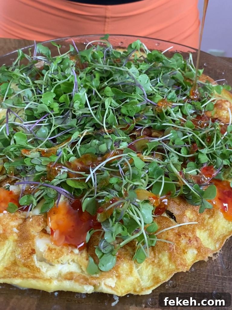 Savory Shrimp Omelette Recipe for Brunch or Quick Dinner 7 Finished omelette topped with greens