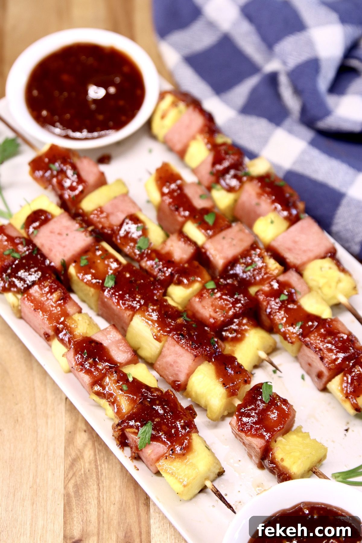 Spam & Pineapple appetizers - grilling recipe Platter of spam and pineapple kabobs with bbq sauce