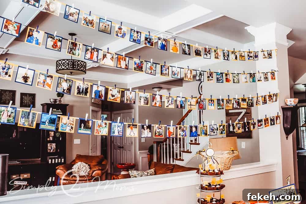 Four rows of photos hanging from ribbon between family room and kitchen for graduation party