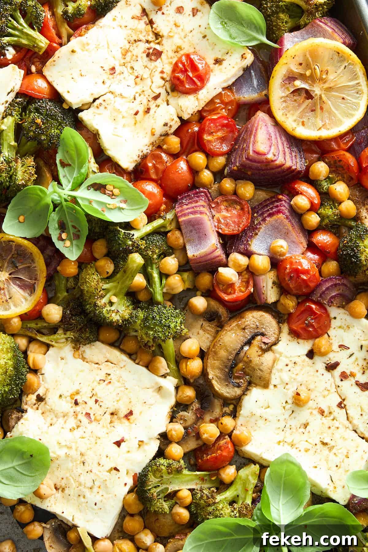 Baked sheet pan feta with veggies and chickpeas.