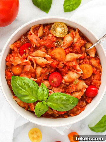 A white bowl filled with vegan bolognese