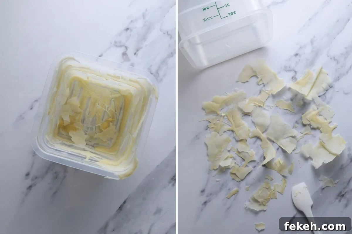 Dehydrating Sourdough Starter: Step-by-Step Guide for Storage 5 Two images side by side. The image on the left is looking down into a square cambro container smeared with sourdough starter that is starting to dry out. The image on the right shows the cambro container laying on its side and the dried sourdough starter flakes spilled out onto the white marble countertop.